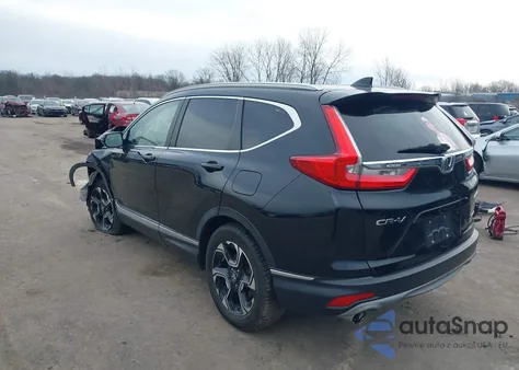 2018 Honda Cr-V Touring z USA, uszkodzony, nr VIN 7FARW2H9XJE067233